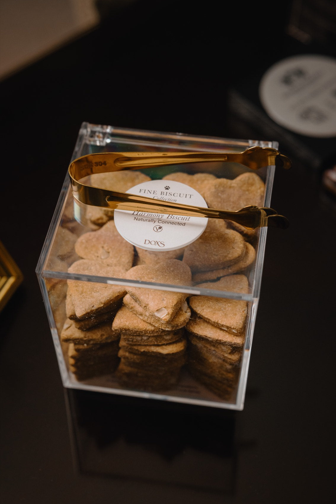 Fine Biscuits in an acrylic box